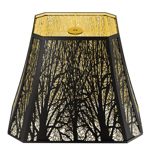 A large rectangle lampshade with a black forest etched pattern on it, with a gold-colored top and bottom.