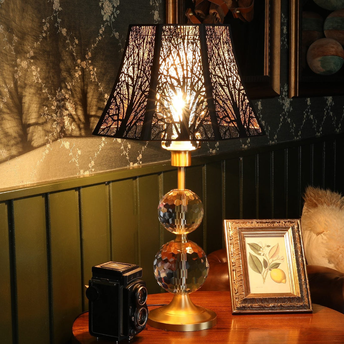 perforated metal lamp shade creating decorative light patterns in a modern living room