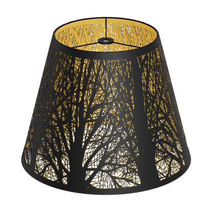 A small metal lampshade with a hand-etched forest design, featuring a black exterior and gold interior.
