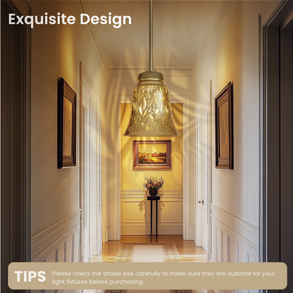 Antique bronze exterior with gold interior lamp shades hanging in a hallway, casting a warm glow.