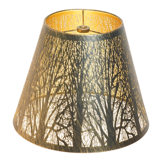 Close-up of a small metal lamp shade replacement featuring antique brass finish, golden interior, and detailed forest cutout design.