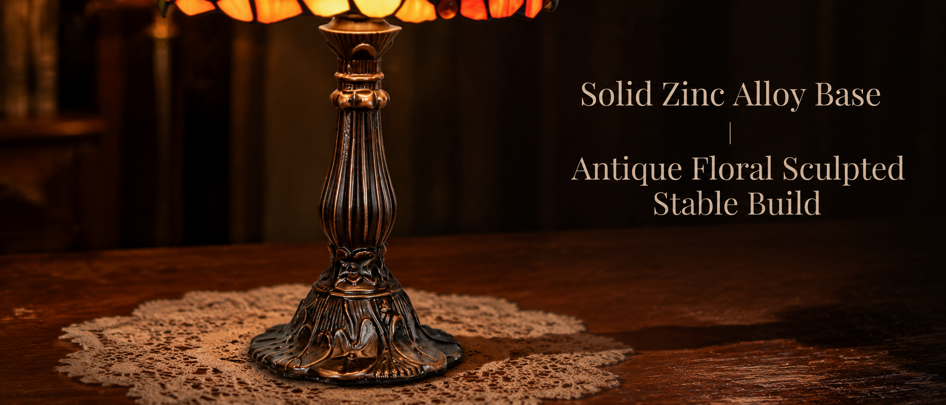 Antique bronze table lamp base with carved floral details showing vintage craftsmanship and durable decorative design