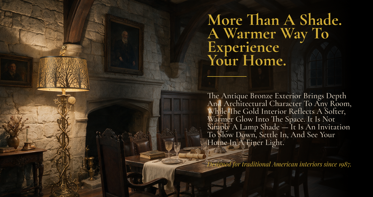 Antique bronze oval metal lamp shade with gold etching, casting warm ambient glow in traditional dining room interior