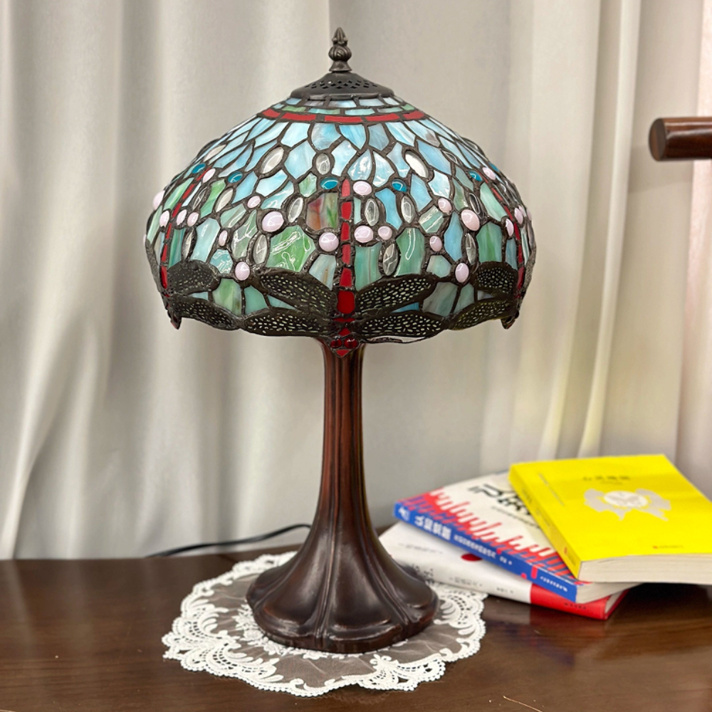 Antique bronze lamp base with elegant scroll detailing inspired by vintage Art Nouveau decorative lighting design