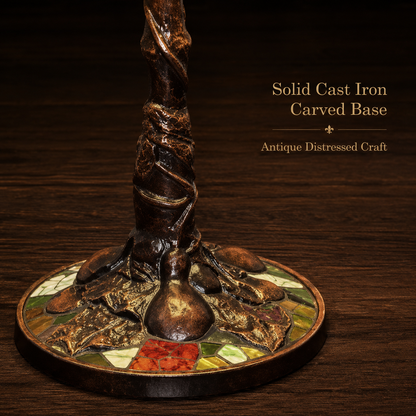 Detailed view of antique cast iron base on a vintage Tiffany table lamp with handcrafted metal craftsmanship