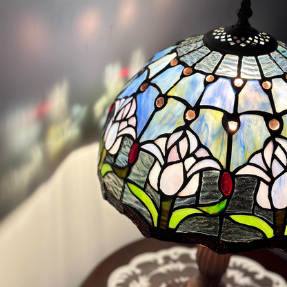 Blue Tulip Tiffany table lamp with soft stained glass glow and Scandinavian inspired minimalist aesthetic