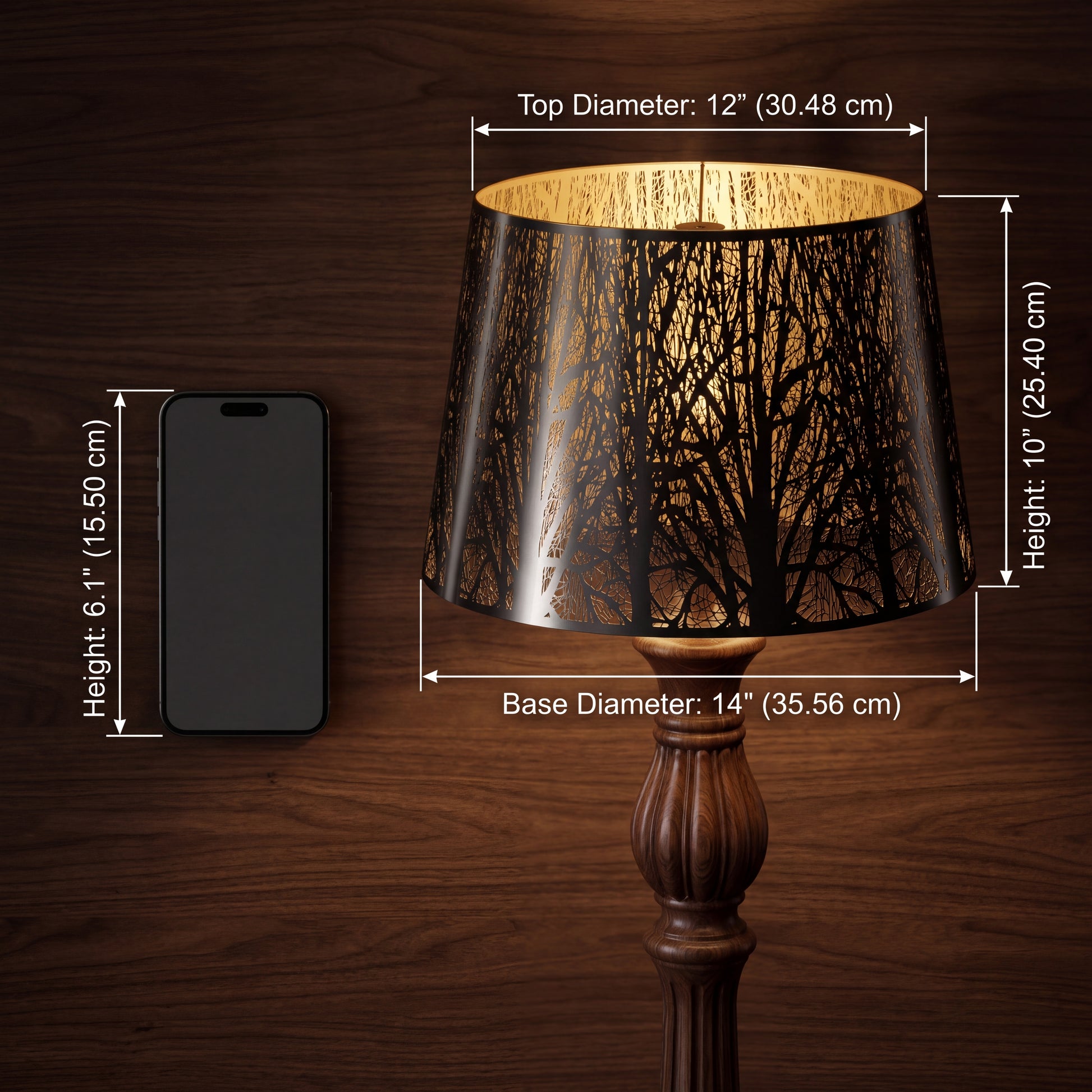 Chrome forest metal lampshade size dimension chart with smartphone size reference comparison, 12 inch top diameter x 14 inch base diameter x 10 inch height, 30.48 cm x 35.56 cm x 25.40 cm, black chrome stainless steel exterior with reflective polished silver chrome finish and warm gold interior with intricate forest tree branch laser cut etched pattern, spider fitter lamp shade designed as replacement for table lamps floor lamps and ceiling fixtures, medium size lampshade fits a wide range of lighting fixtu