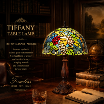 Classic American Tiffany table lamp with grape stained glass artwork creating an elegant vintage atmosphere in home interiors
