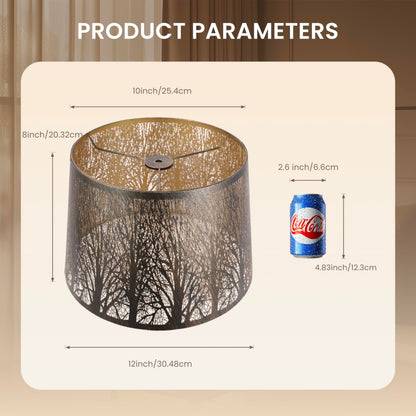 Drum tree etched metal lampshade installed on floor lamp creating warm decorative lighting in living spaces