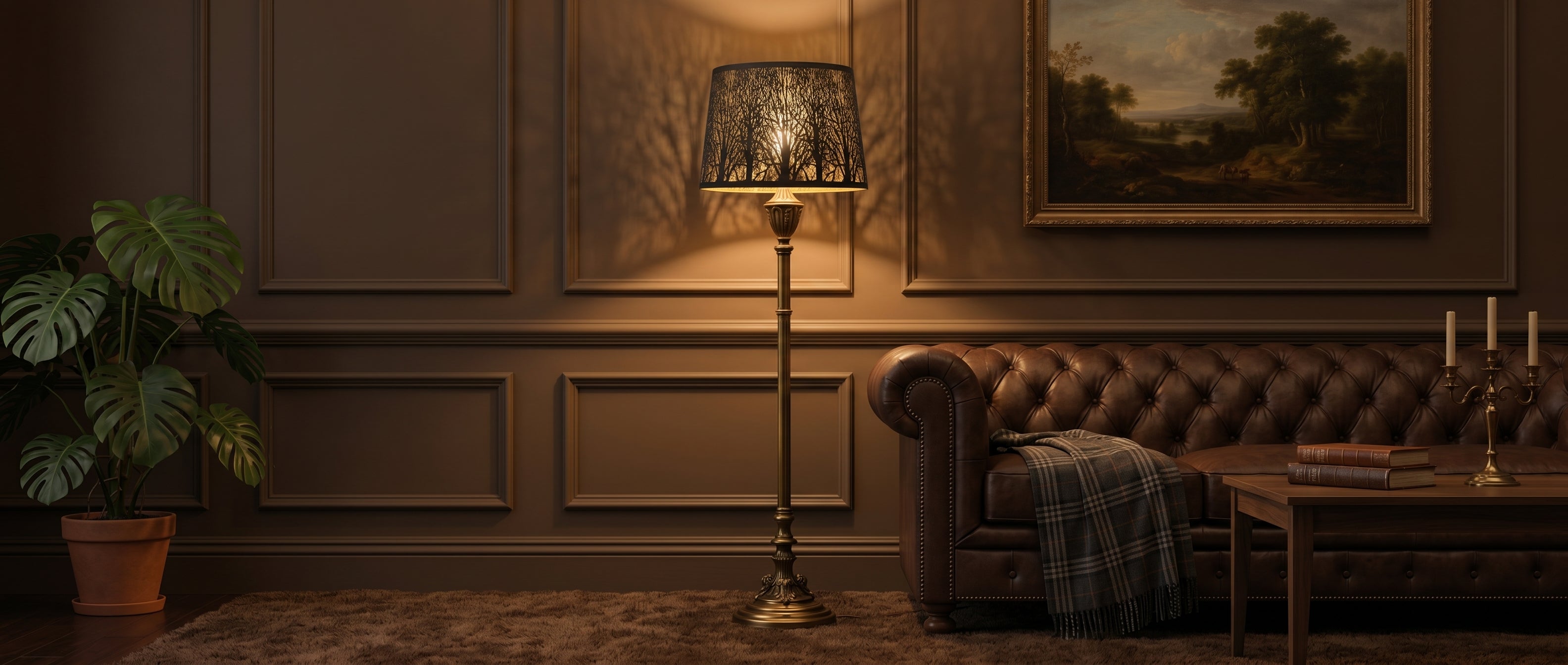 Drum Tree Etched Metal Lamp Shade on Ornate Brass Floor Lamp in Classic Living Room with Brown Chesterfield Leather Sofa and Paneled Wall, Creates Beautiful Tree Branch Shadow Projection, Matte Bronze/Black Exterior with Gold Interior, 10"x12"x8" Replacement Shade for Floor Lamps and Table Lamps, Warm Ambient Lighting for Modern and Vintage Interiors