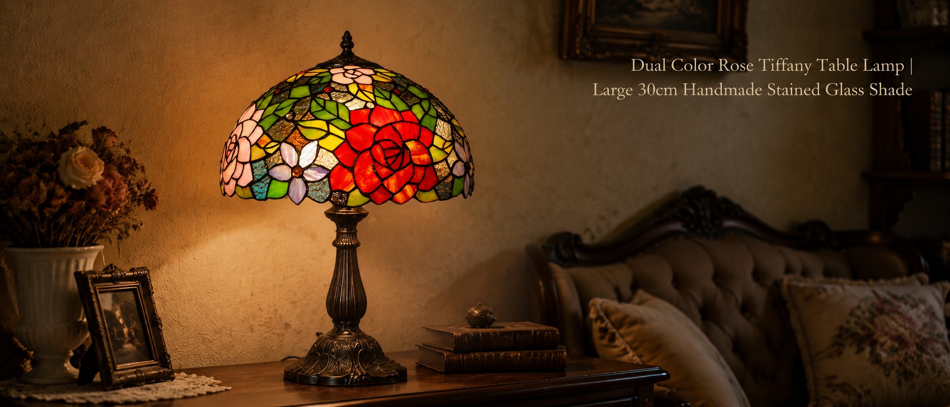 Dual color rose Tiffany lamp with handmade stained glass shade displayed on a vintage bedroom nightstand