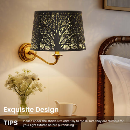 Close up of etched tree pattern on large drum metal lampshade highlighting decorative craftsmanship and textured finish