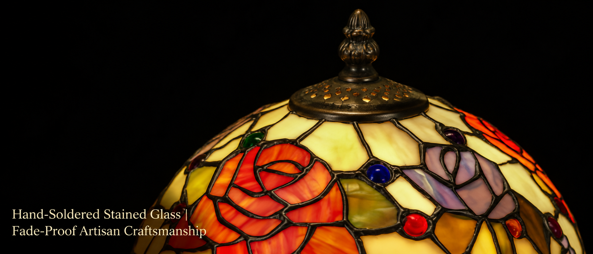 Handcrafted floral stained glass lampshade featuring detailed rose patterns, colorful glass pieces and artisan craftsmanship