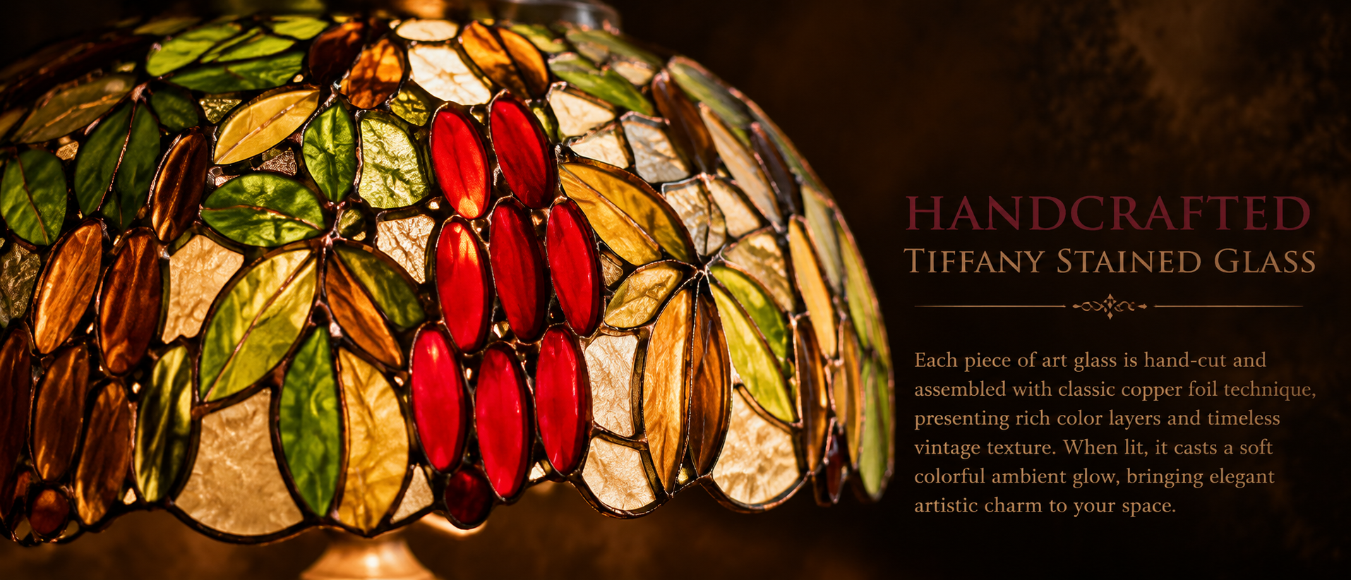 Close up of handcrafted Tiffany stained glass shade featuring fruit orchard inspired leaves and colorful glass textures