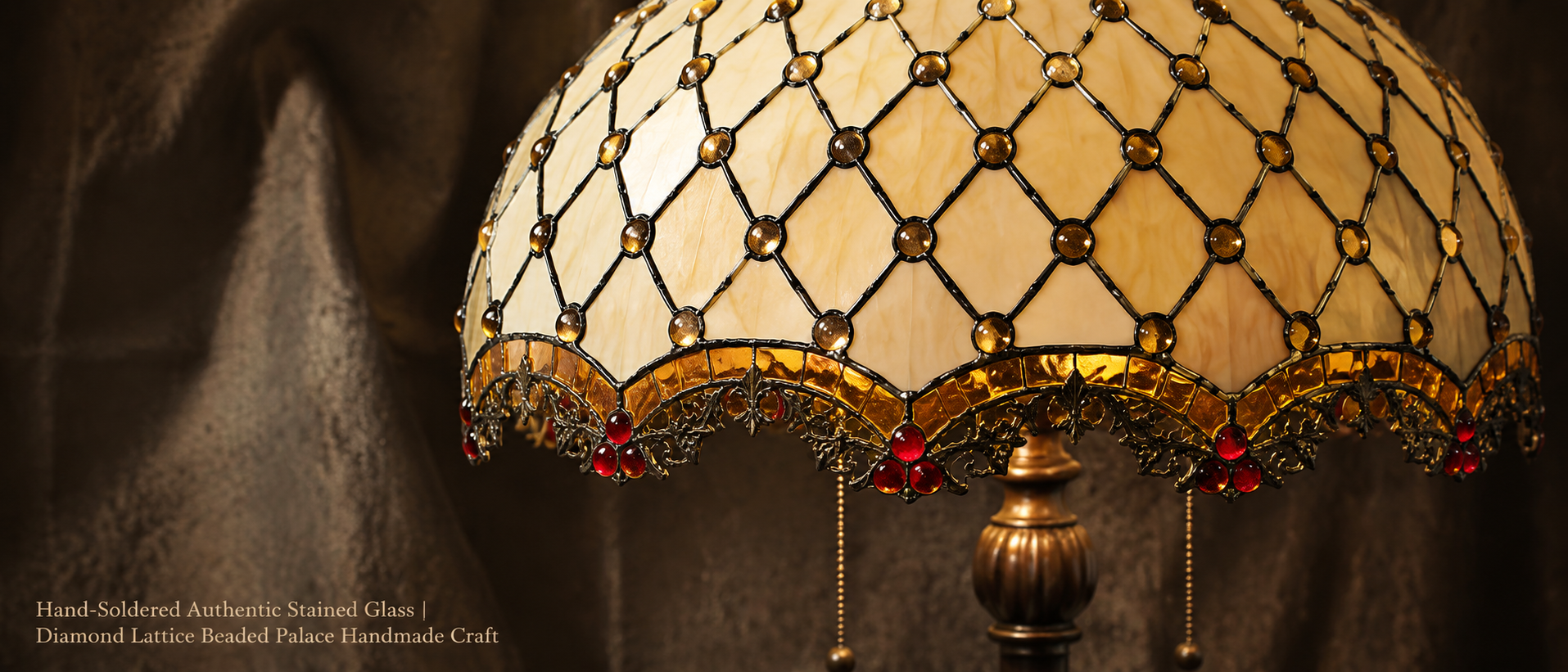 Handcrafted Tiffany stained glass lampshade featuring diamond pattern glass pieces and vintage bead decoration details