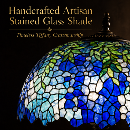 Close up view of handcrafted wisteria stained glass lamp shade featuring blue purple floral mosaic glass design