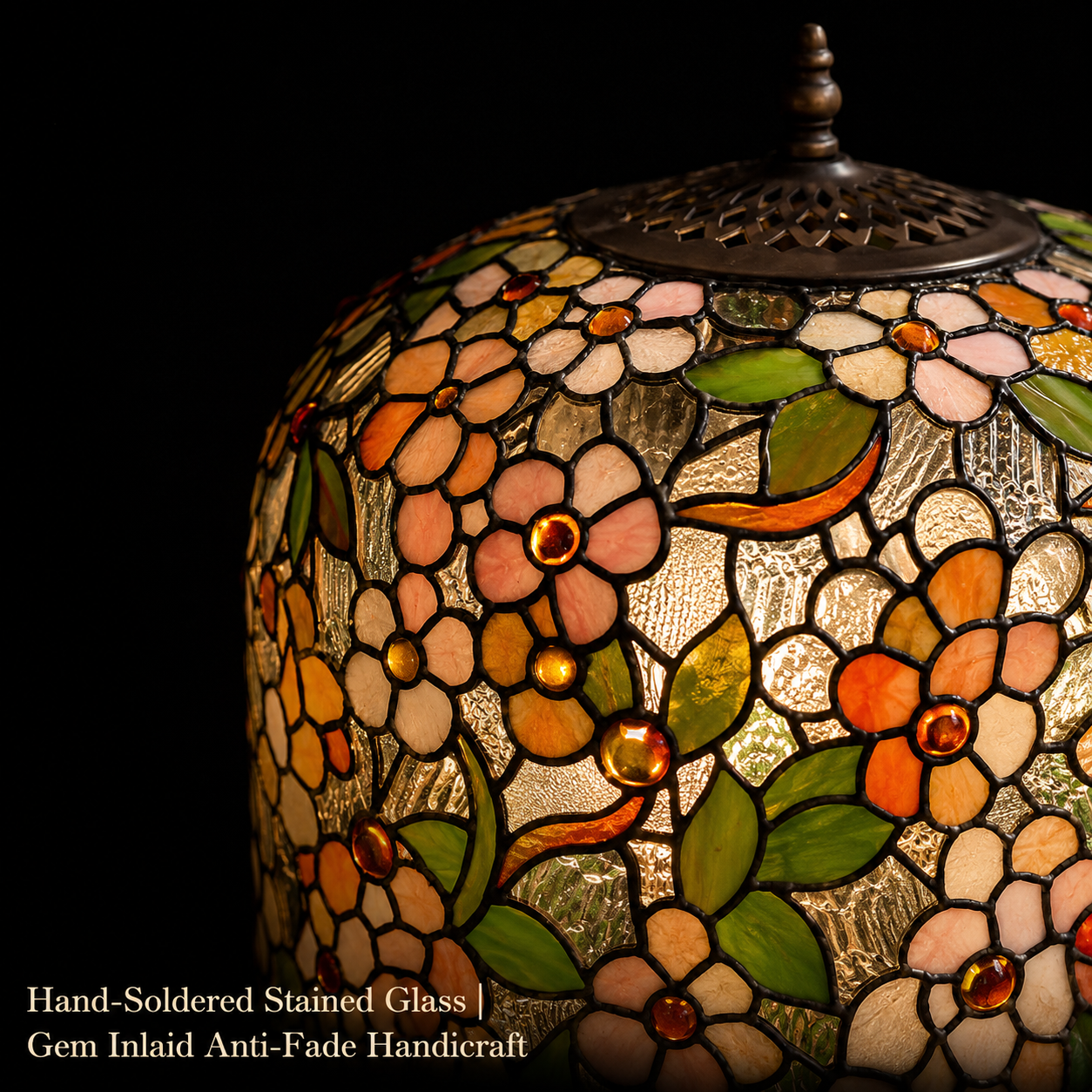 Close-up view of handmade Apple Blossom stained glass Tiffany lamp shade featuring floral patterns, colorful glass pieces, and traditional craftsmanship