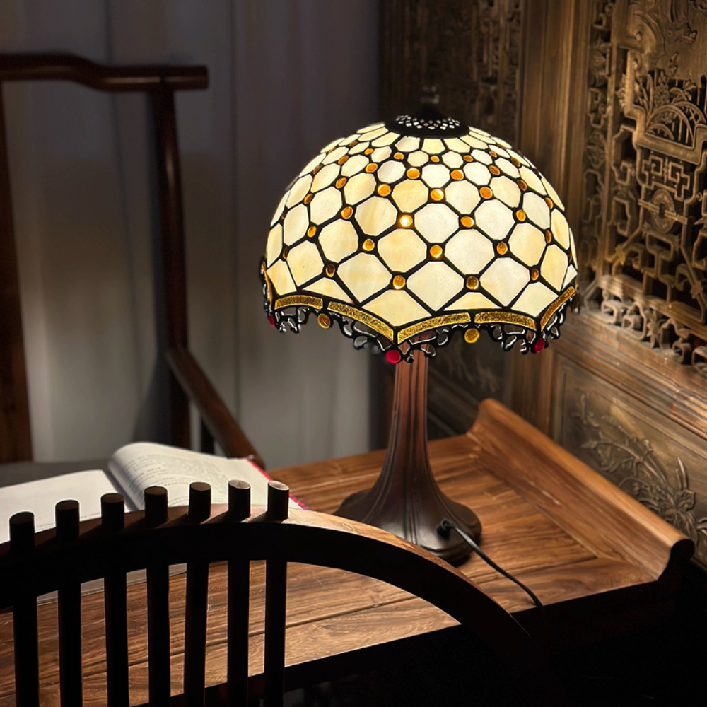 Imperial Jewel Curtain table lamp featuring an amber stained glass shade and elegant golden bead fringe