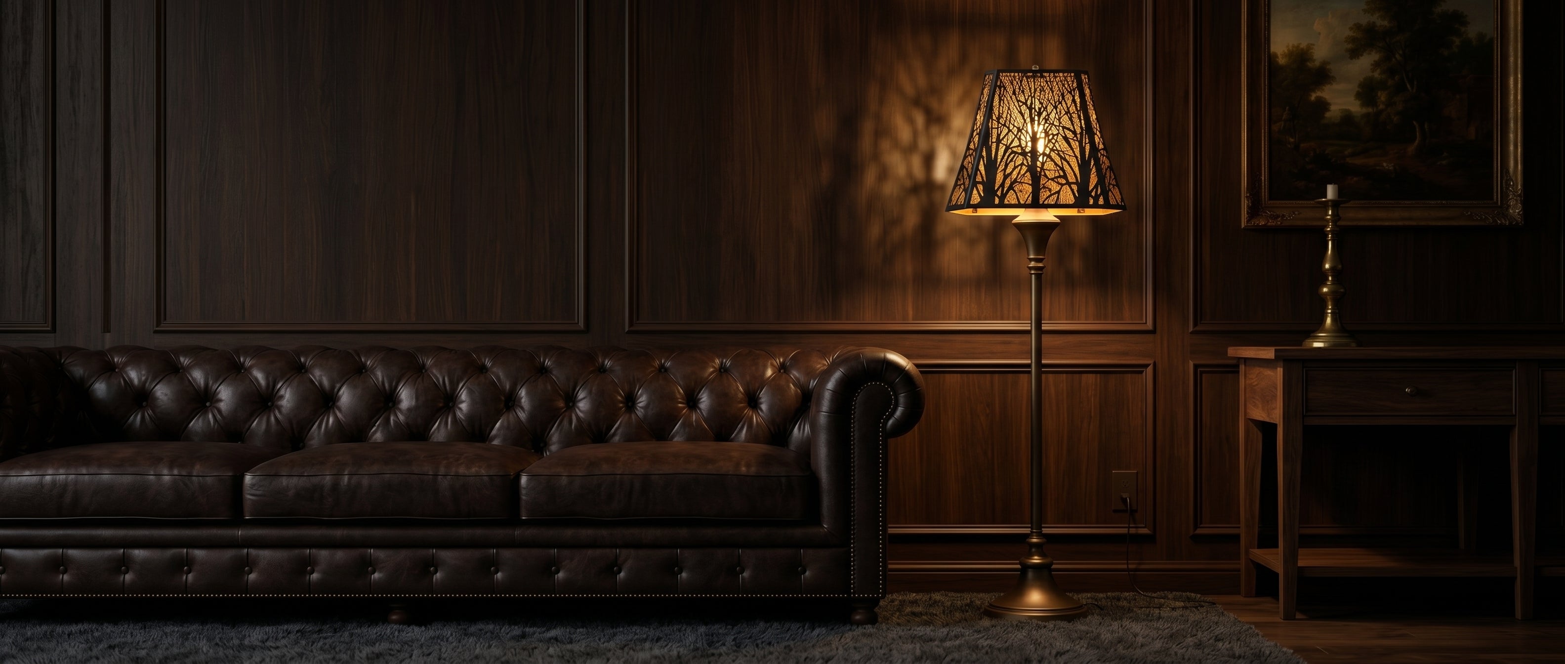Large Rectangle Forest Etched Metal Lamp Shade on Ornate Brass Floor Lamp in Classic Dark Wood Paneled Living Room with Brown Chesterfield Tufted Leather Sofa, Framed Landscape Oil Painting in Antique Gold Frame, Simple Wood Side Table with Brass Candlestick, Soft Grey Shag Rug, Black Metal Rectangle Shade with Intricate Laser-Cut Bare Tree Branch Pattern Casts Dramatic Forest Shadow Projection on Wood Wall, Warm Gold Interior Creates Rich Ambient Glow, 8"x13.9"x11" Replacement Shade for Floor Lamps, Statem