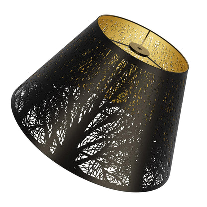 Forest etched metal lampshade used in modern and vintage interiors creating elegant ambient home lighting atmosphere
