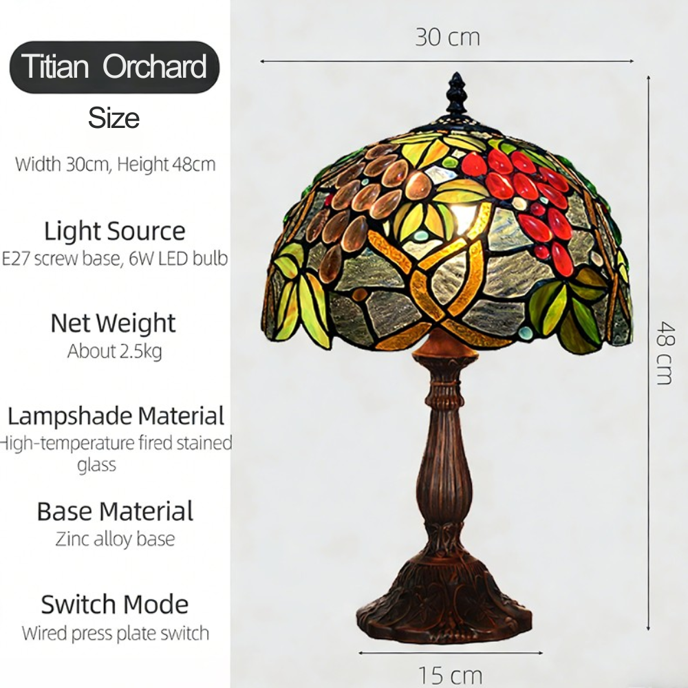 Vintage fruit Tiffany table lamp featuring orchard inspired stained glass shade with antique bronze base in rustic cottagecore style