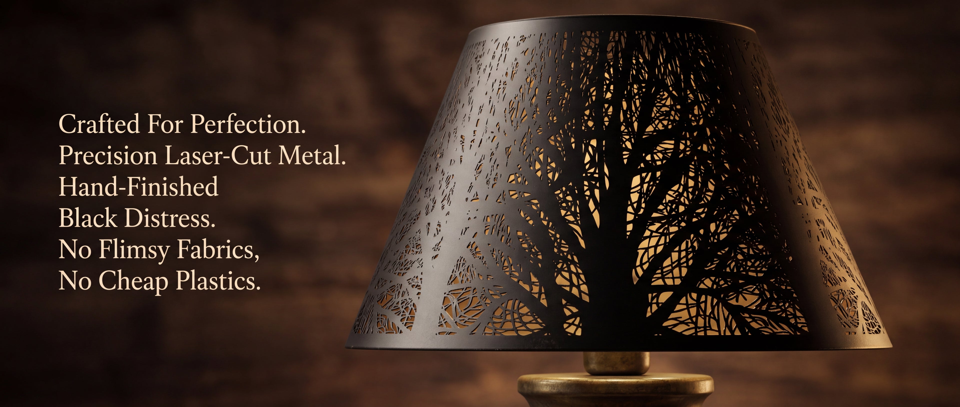 Modern Forest Etched Metal Lamp Shade - Craftsmanship Close-Up on Vintage Brass Table Lamp Base - "Crafted For Perfection, Precision Laser-Cut Metal, Hand-Finished Black Distress, No Flimsy Fabrics, No Cheap Plastics" - Intricate Tree Branches and Leaves Pattern in Black Metal with Gold Interior Glow Shining Through - 7"x13"x7.8" High Quality Durable Replacement Shade for Table Lamps, Floor Lamps, Decorative Fixtures, Perfect for Warm Ambient Lighting in Modern and Vintage Interior Spaces