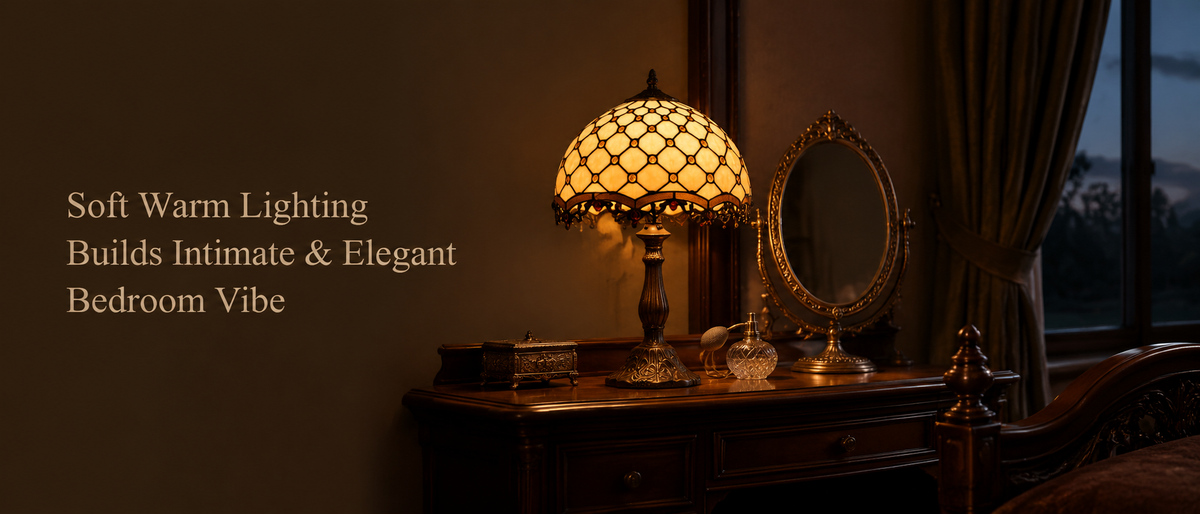 Tiffany bedside lamp beside a vintage bedroom dresser providing soft warm night lighting and elegant atmosphere