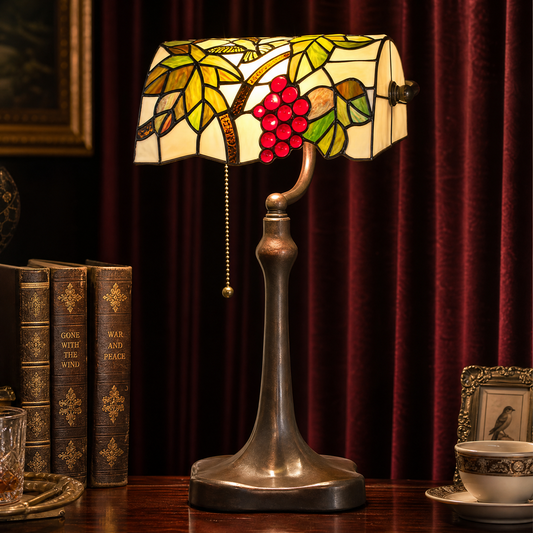Tiffany style banker lamp with stained glass grape design and vintage metal base for study or office desk