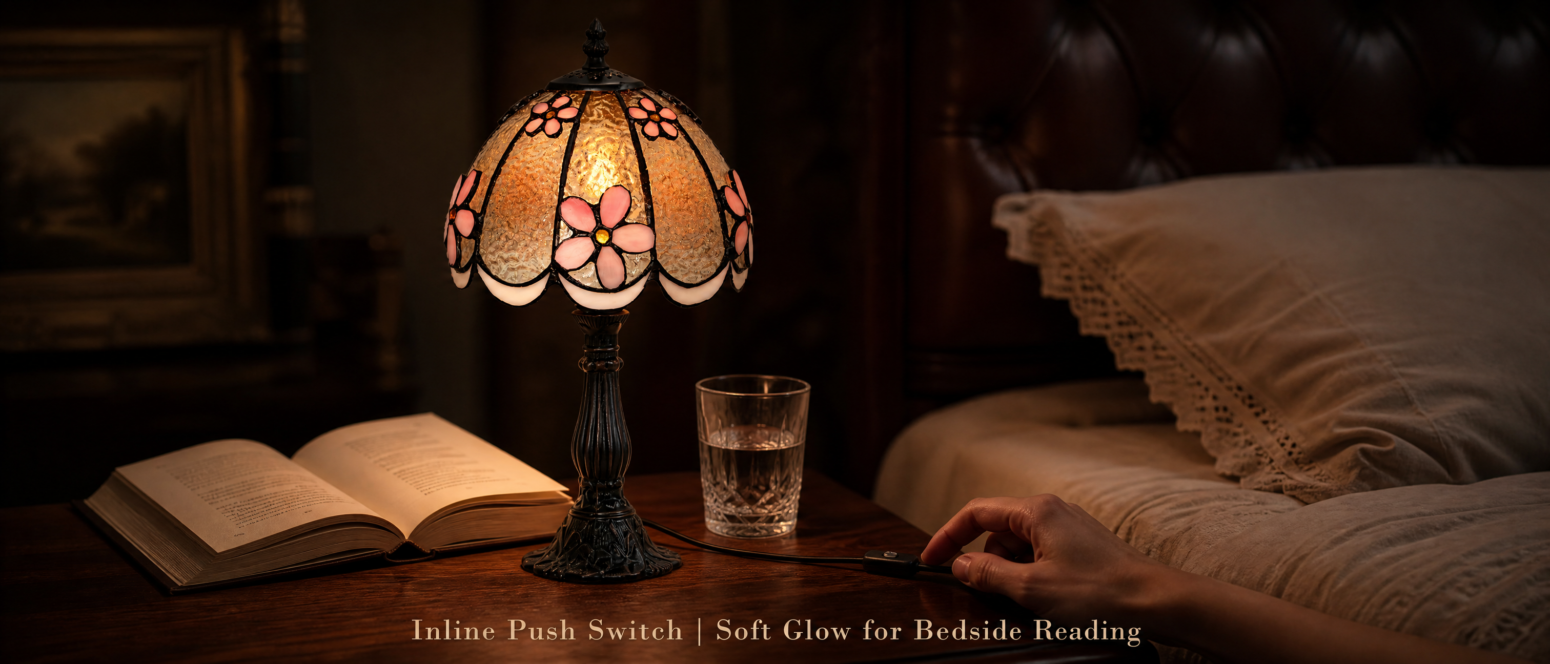 Tiffany style pink floral bedside reading lamp with inline push switch and soft warm light on a bedroom nightstand