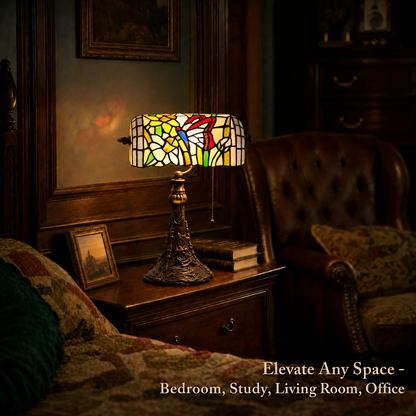 Tiffany style butterfly banker lamp with stained glass shade displayed in a vintage study and home office setting