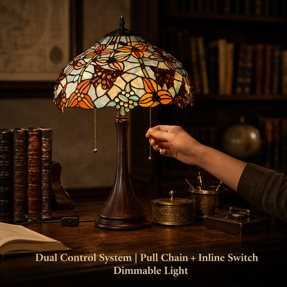 Vintage Tiffany table lamp featuring pull chain switch control and warm decorative lighting for home interiors