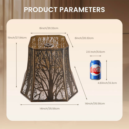Close-up of etched tree pattern on square bell metal lamp shade with black and gold decorative finish