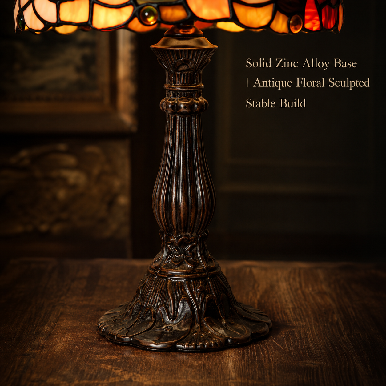 Vintage Tiffany table lamp with antique zinc alloy base and carved floral details showing classic handcrafted design