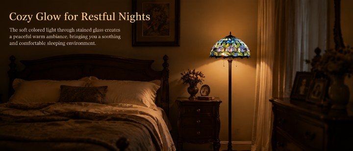 Blue Tulip stained glass floor lamp creating a warm relaxing glow in a vintage bedroom interior for cozy evenings