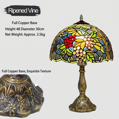 Grape cluster stained glass table lamp enhancing warm wine themed dining room ambiance with rustic lighting
