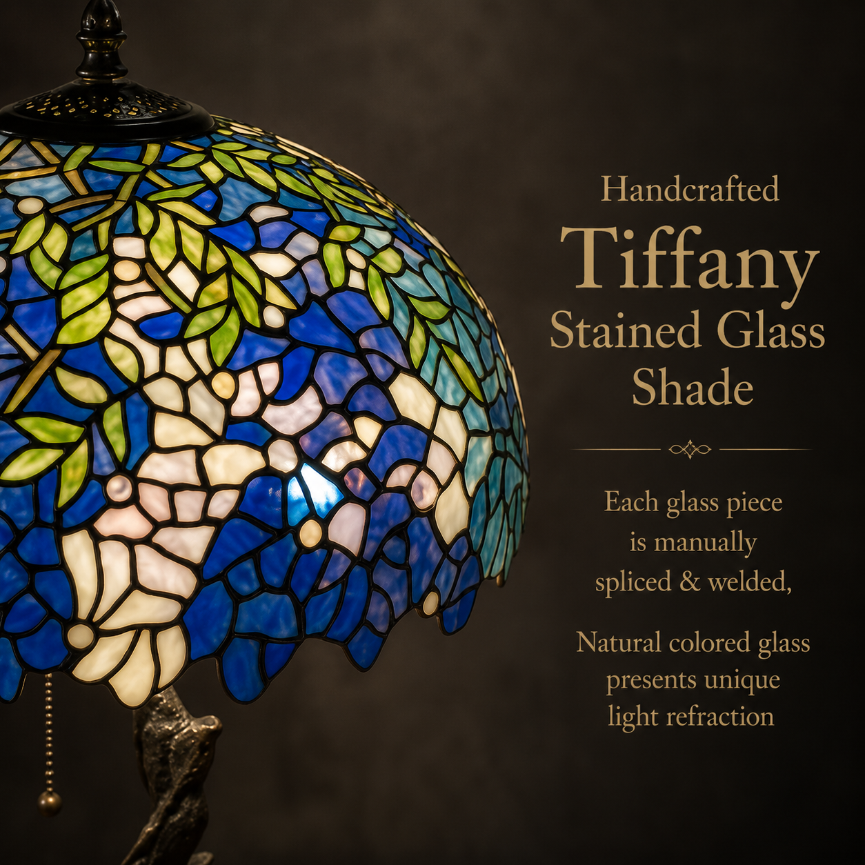 Handcrafted wisteria stained glass shade detail of a Tiffany table lamp featuring blue glass panels and floral artwork
